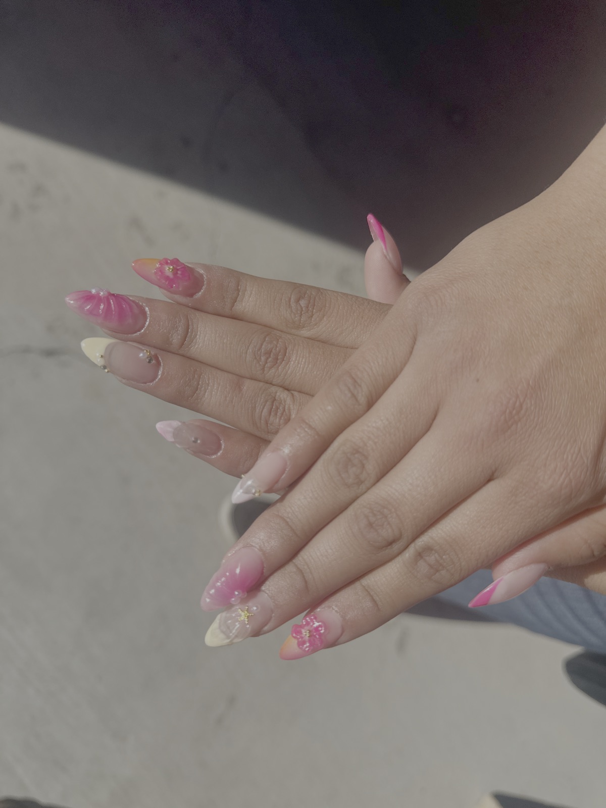 Pink almond floral nail art set by Polished by Bug in Cedar City, Utah